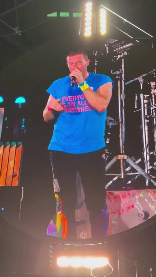Chris shouts out Tom Cruise from the stage