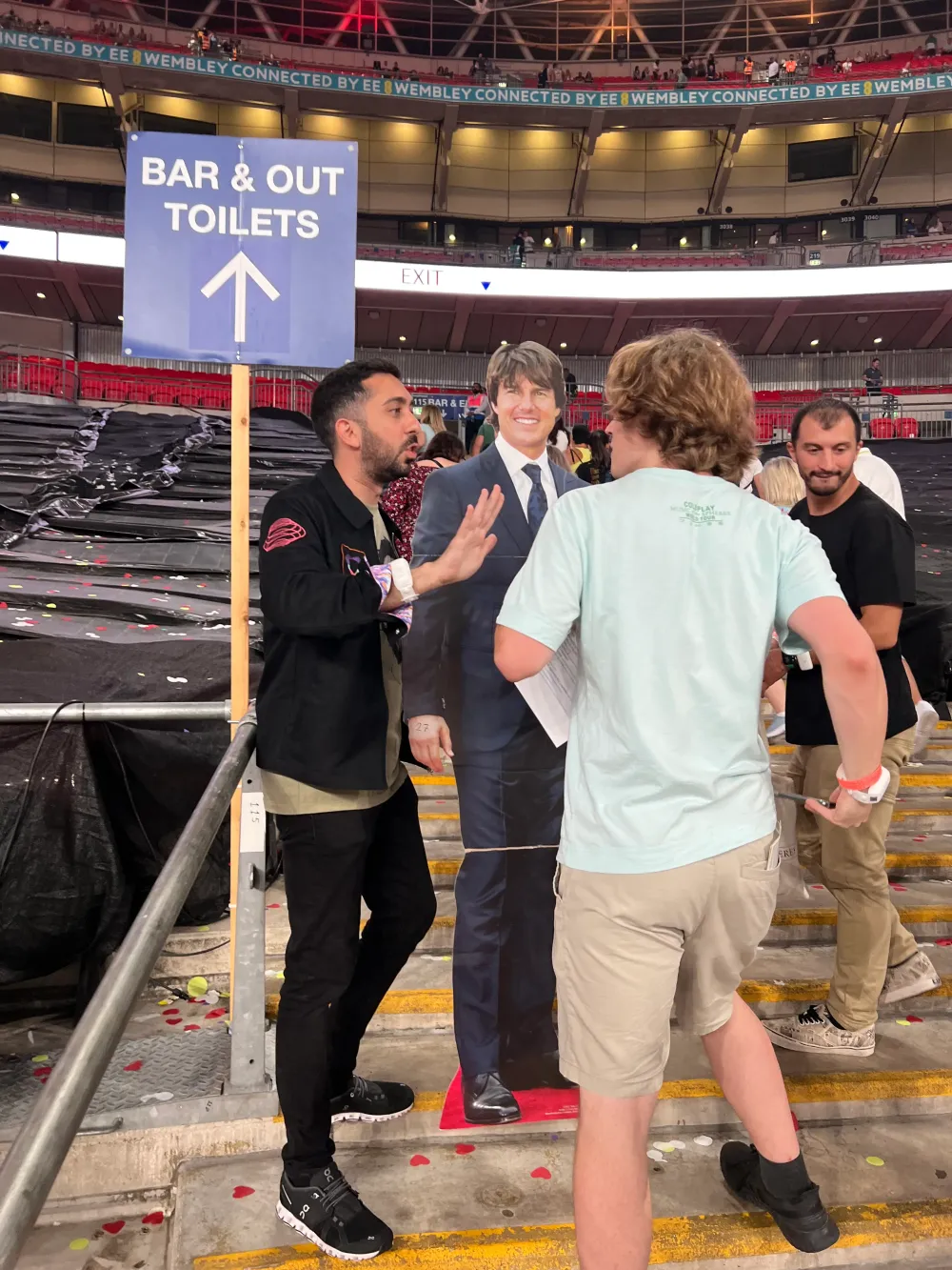 Jimmy Dushku escorting cardboard Tom Cruise away from fans