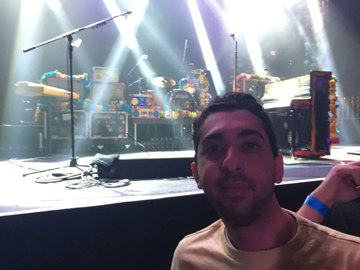 Jimmy Dushku taking a selfie in front of the stage before Coldplay's set at the Belasco