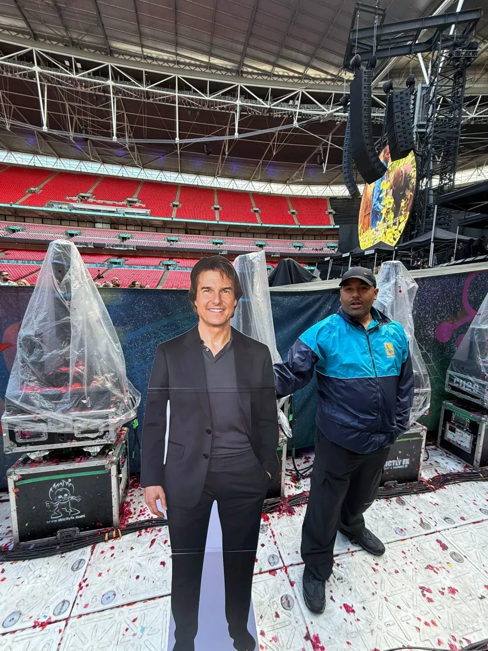 A cardboard cutout of Tom Cruise standing at the barrier at Wembley Stadium before Coldplay took the stage