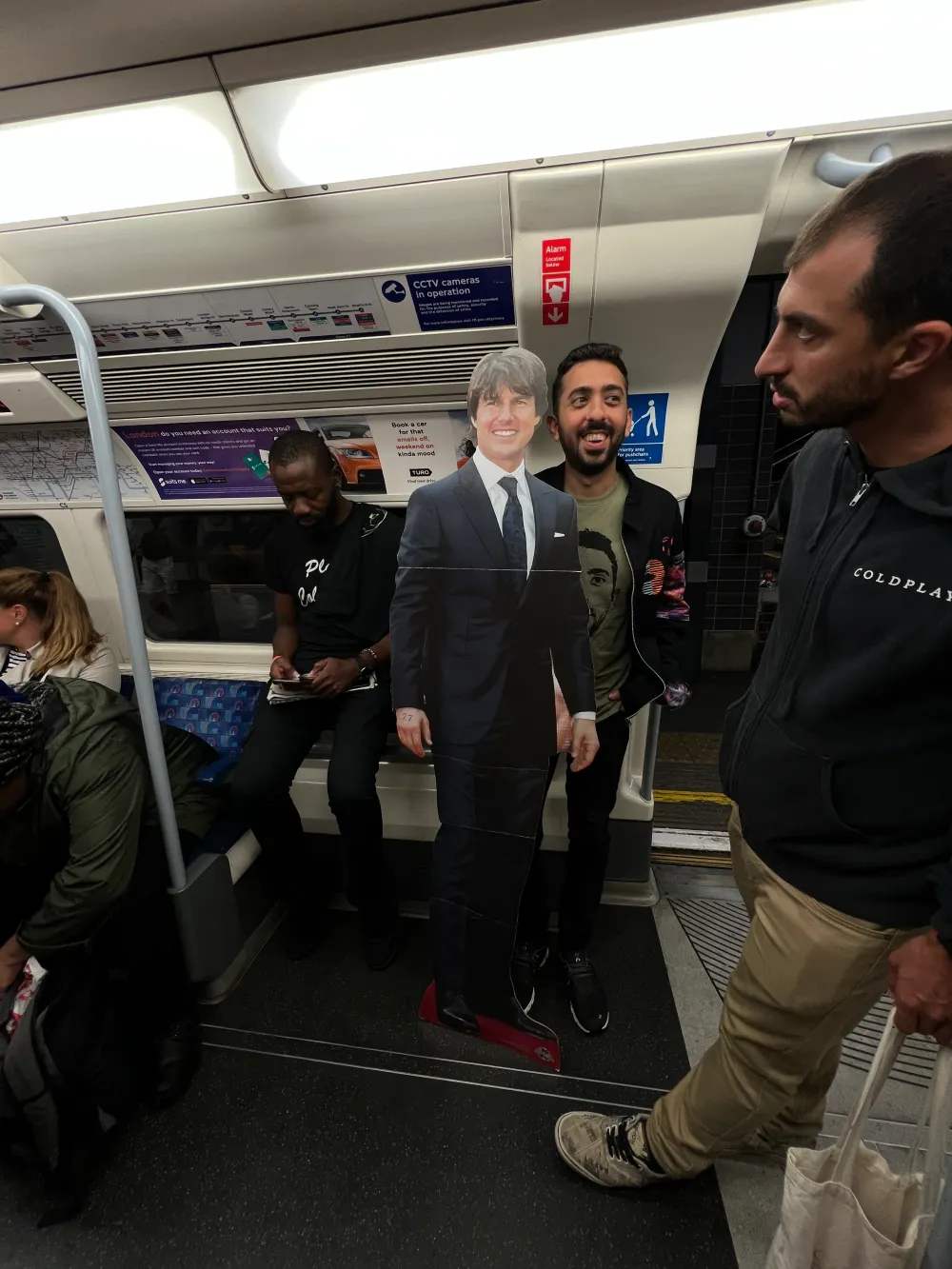 Jimmy Dushku and cardboard Tom Cruise taking the tube after the show