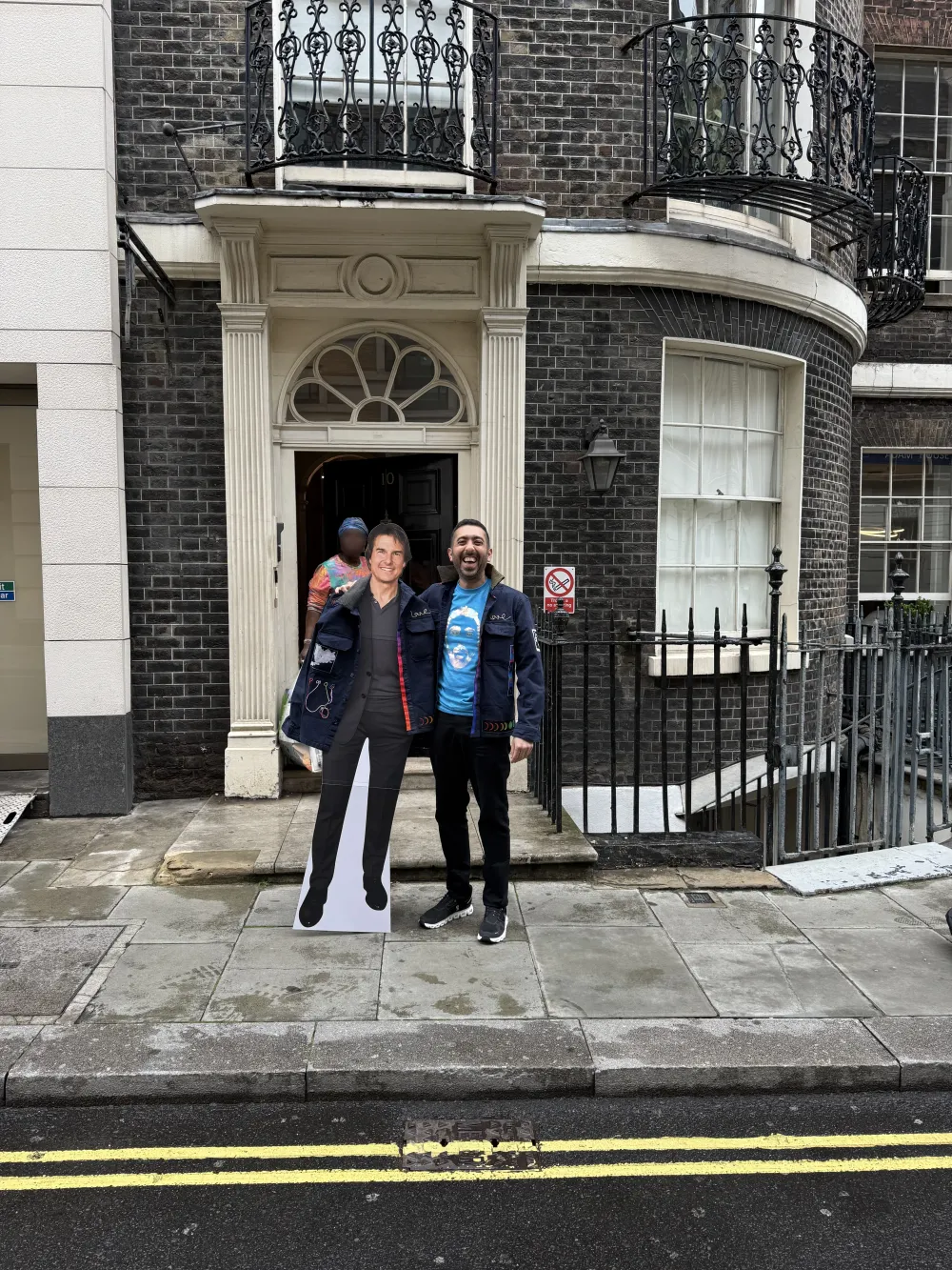 Jimmy Dushku laughing as a stranger, not the Prime Minister, answers the door at the fake 10 Downing Street