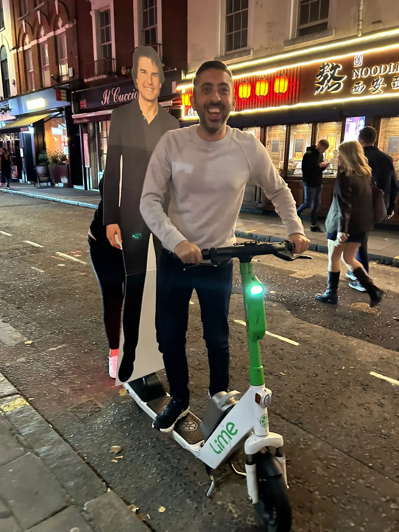 Tom's first scooter ride, courtesy of Jannie