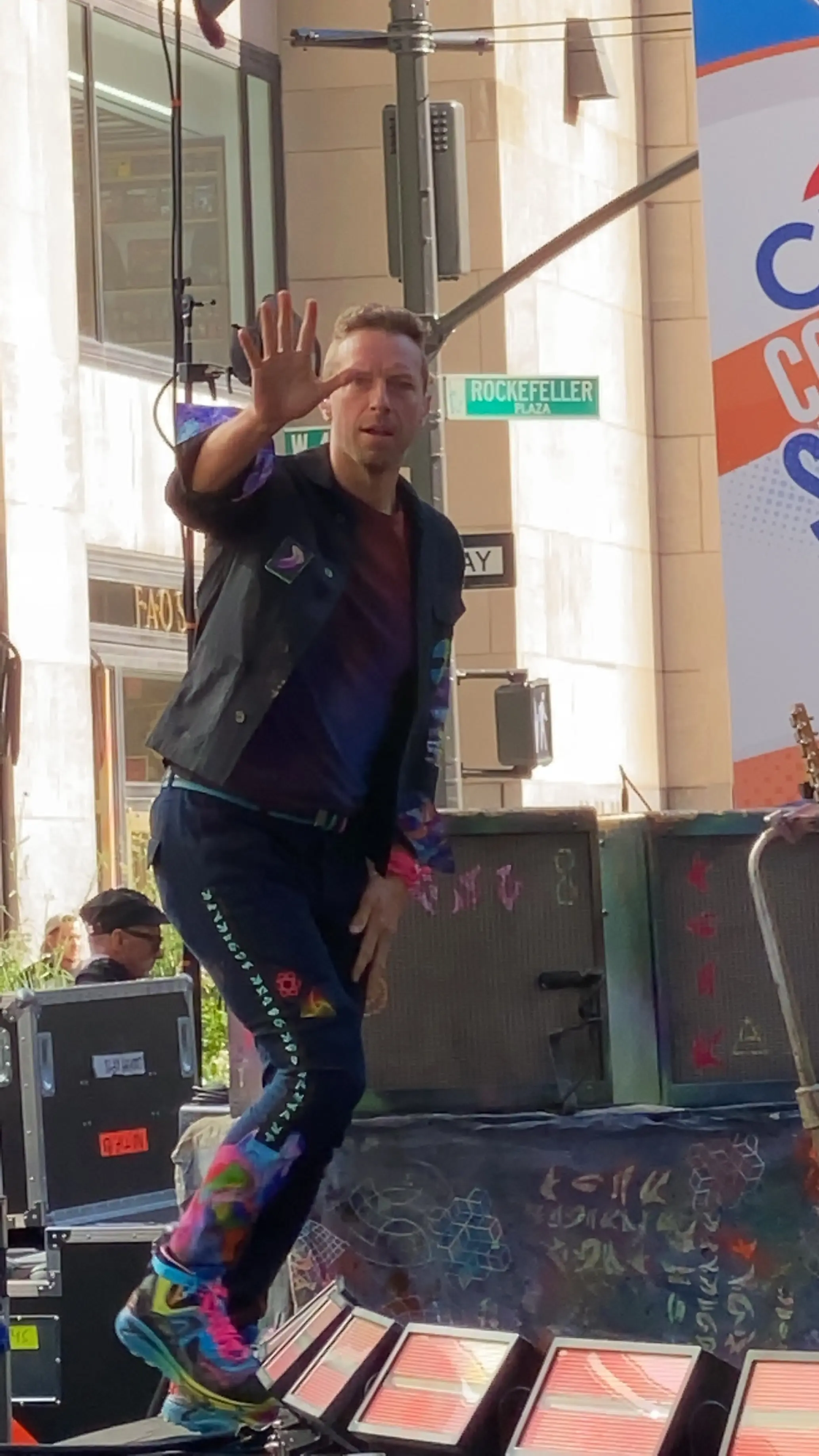 Chris Martin taking the stage at the Today Show