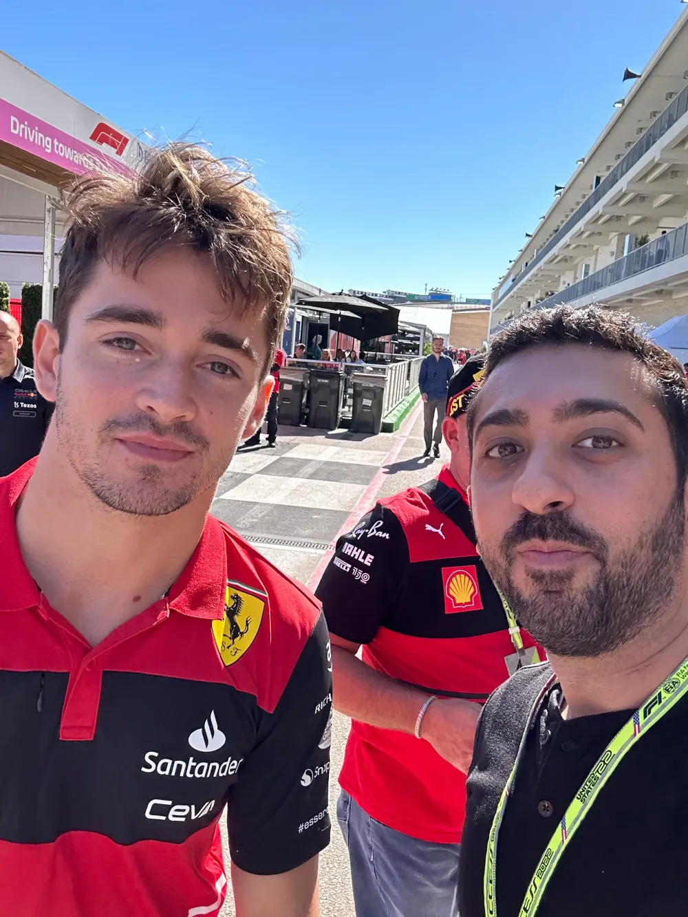 Jimmy Dushku with Charles Leclerc in the Ferrari paddock