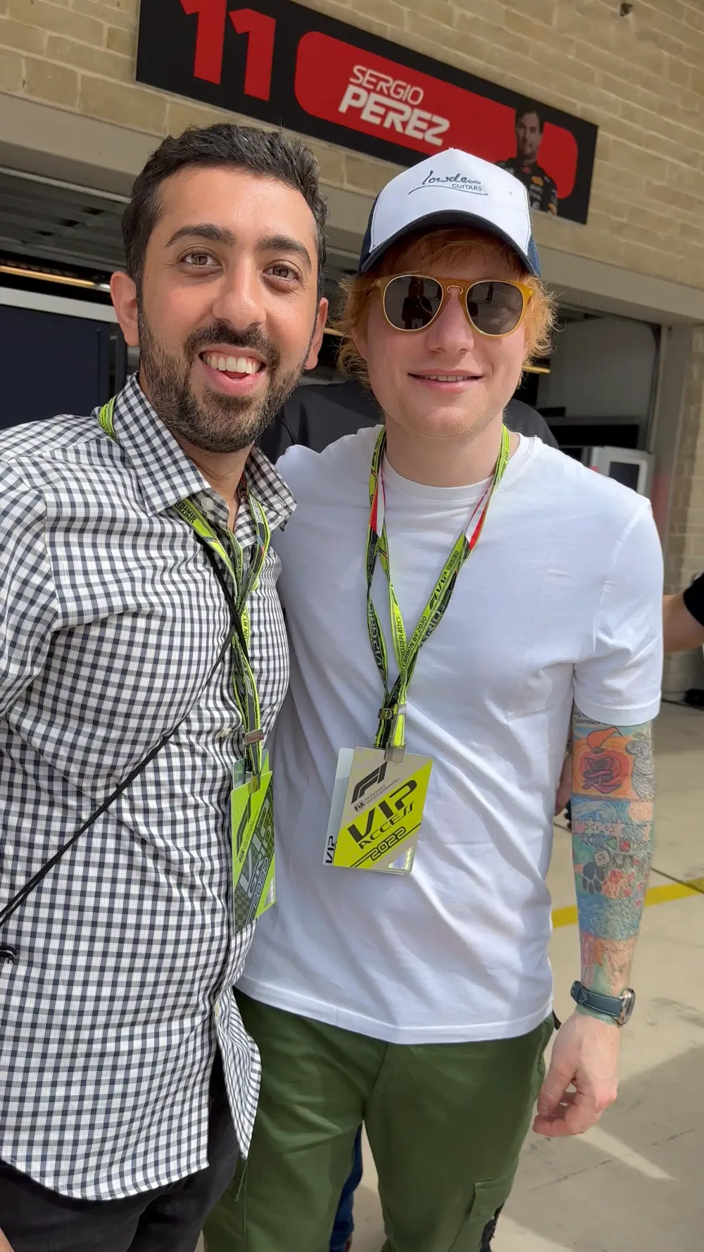 Jimmy Dushku with Ed Sheeran walking out to the starting grid
