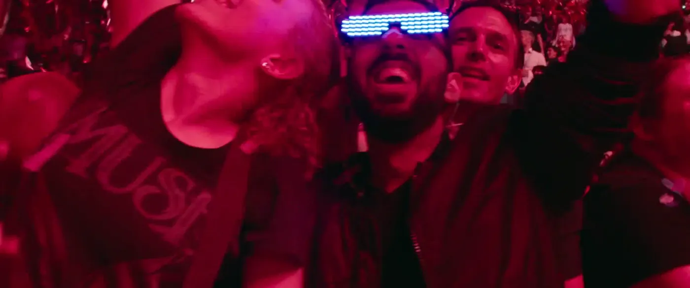 Jimmy Dushku and his friend Joe among the crowd at a Muse concert, later included in the Simulation Theory concert film