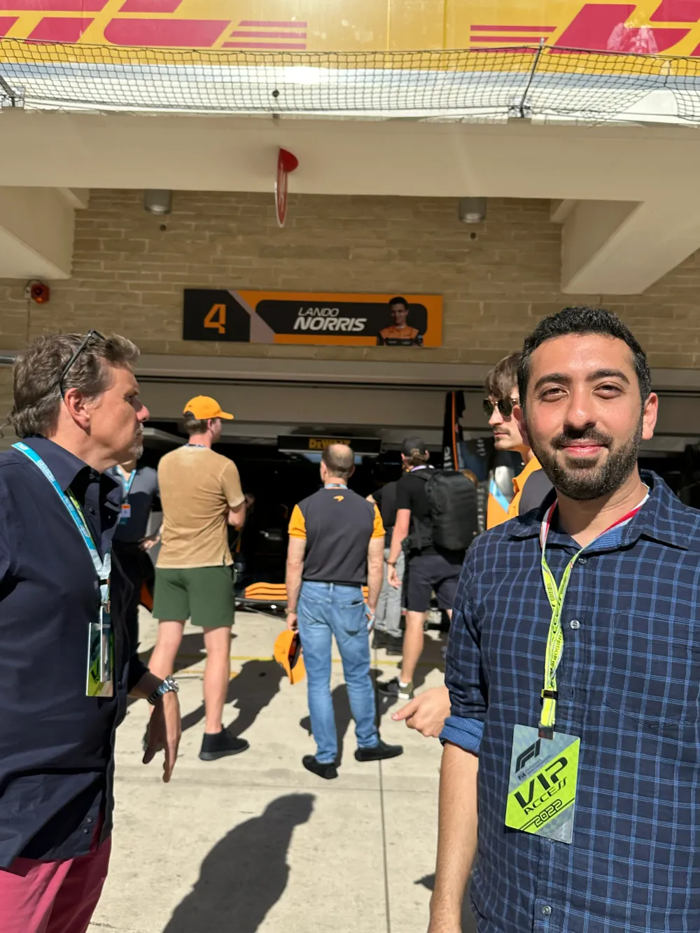 Jimmy Dushku getting a tour of the McLaren garage from Mark Stewart and Sultan Ojjeh