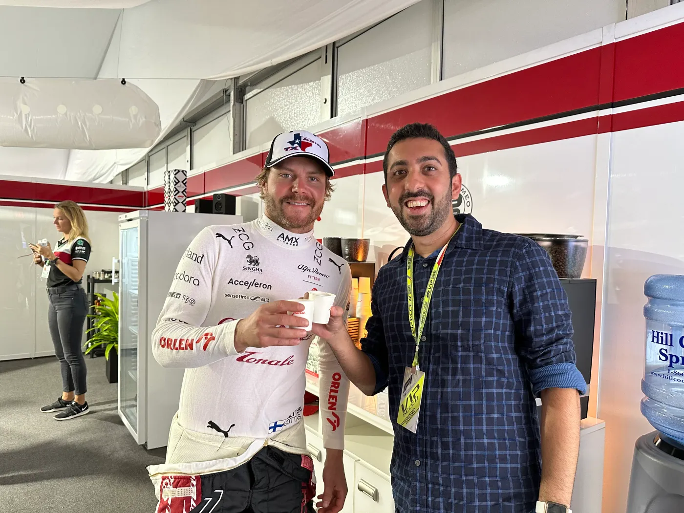 Jimmy Dushku having coffee with Valtteri Bottas in the Alfa Romeo hospitality unit