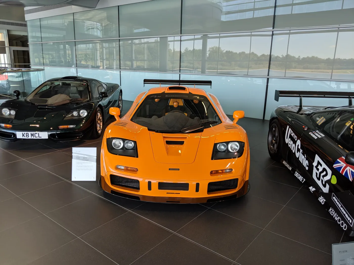 A lineup of McLaren F1 road car variants including the F1 LM on display at the Technology Centre
